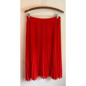 Louche bright red/orange pleated midi skirt, size UK 10, US 6